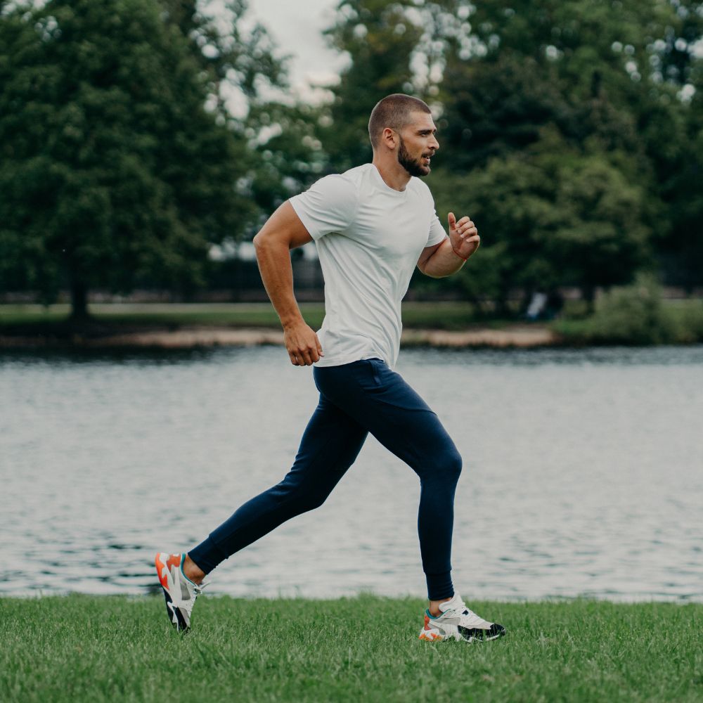 Man running outdoors for endurance, fitness, and active lifestyle support